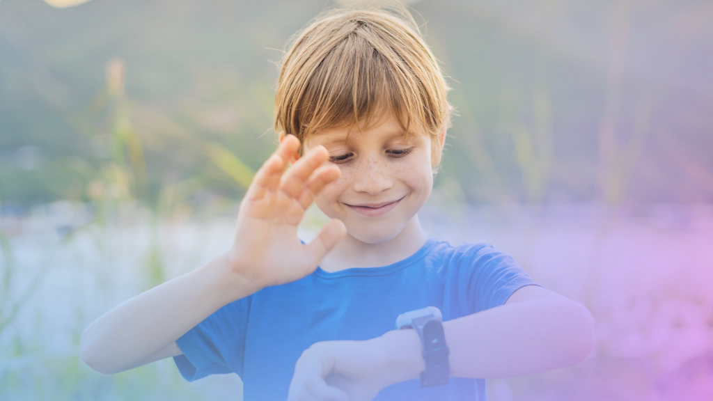 young boy with smart watch